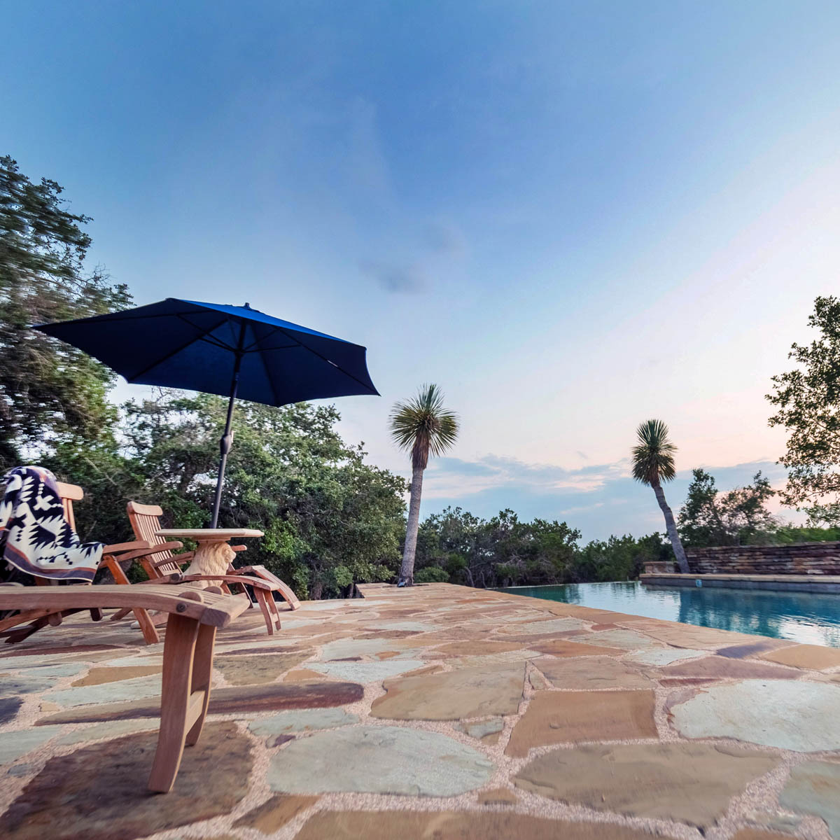 mystic-sky-ranch_pool-with-loungers-and-chairs